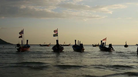 Group of long tail  boat with sunset at beach in phuket thailand. Stock-Footage 73617446