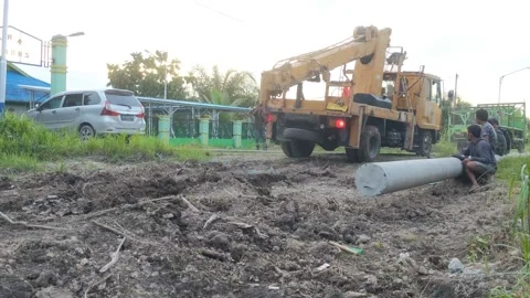 A group of male laborers at work Stock Footage 220245045
