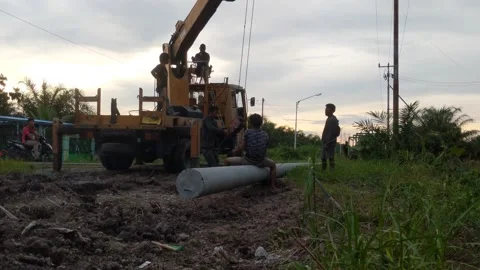 A group of male laborers at work Stock Footage 220245061