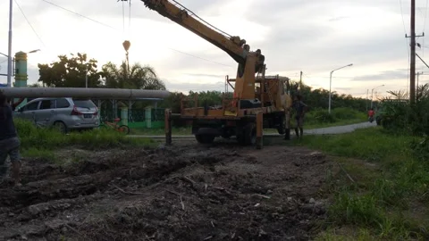 A group of male laborers at work Stock Footage 220245065