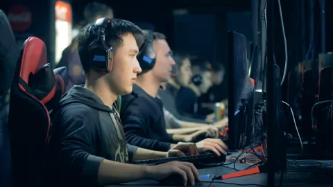 Group of men are gaming in a computer club Stock Footage 113611901