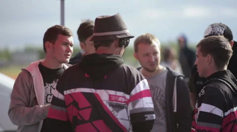 Group of men discussing something with the racing judges Stock Footage