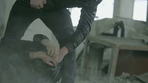 Group of men fighting in abandoned building . Vídeos de archivo 123708848