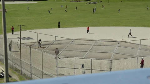 Group of men playing cricket in the park. 4K UHD. Stock-Footage 51137139