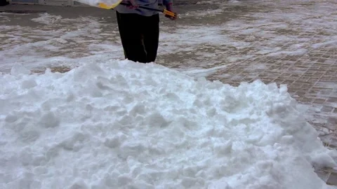 A group of men removes snow. Stock Footage 231430358
