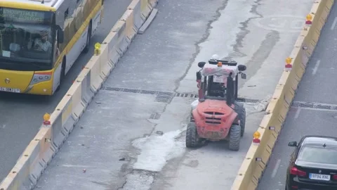 Group of men workers industrial machinery paving the road  in the public street Stock-Footage 163154341