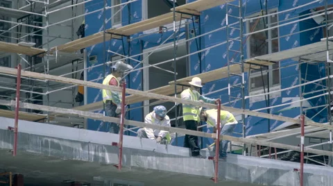 Group of Men Working on Building Construction Stock Footage 63356231