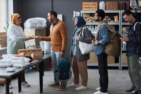Group Of Middle Eastern People Standing in Line Stock Photos