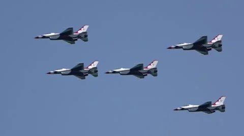 Group of military fighter planes flying over the coast Stock Footage
