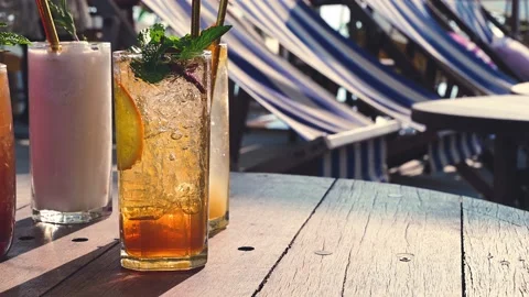 Group of mocktail drinks on the table at the poolside of summertime on holiday. Stock Footage 149465184