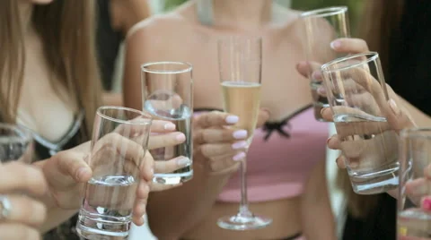 Group of models drinking champagne from glasses at a party Stock Footage 59658248