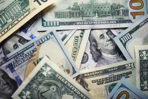 Group of money stack of 100 US dollars banknotes a lot of the background te.. Foto stock