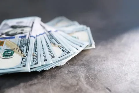 Group of money stack of 100 US dollars banknotes a lot of the background te.. Stock Photos