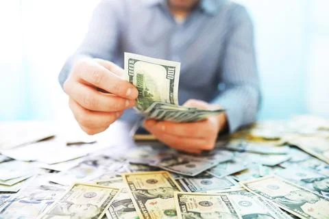 Group of money stack of 100 US dollars banknotes a lot of the background te.. Foto stock