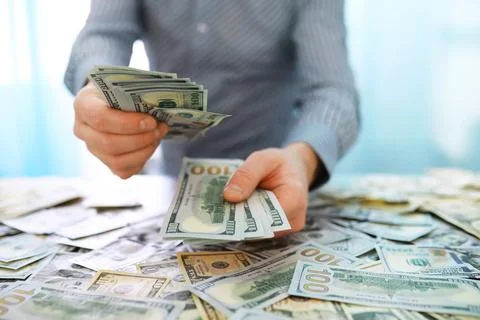 Group of money stack of 100 US dollars banknotes a lot of the background te.. 스톡 사진