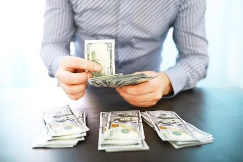Group of money stack of 100 US dollars banknotes a lot of the background te.. 스톡 사진