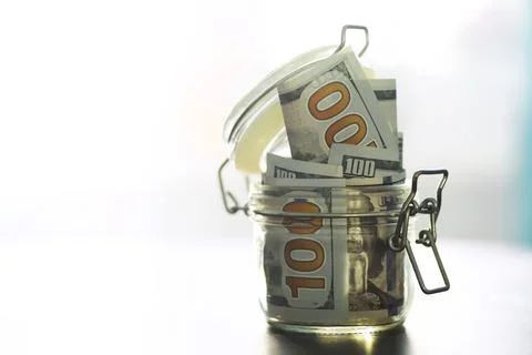 Group of money stack of 100 US dollars banknotes a lot of the background te.. Stock Photos