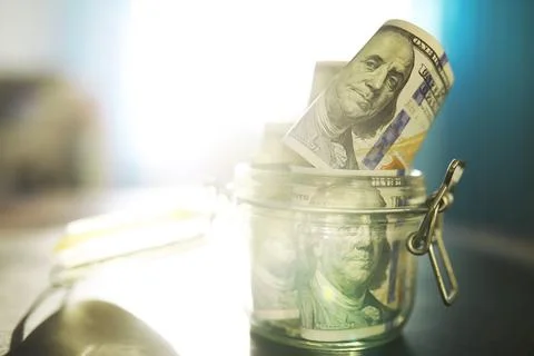 Group of money stack of 100 US dollars banknotes a lot of the background te.. Stock Photos