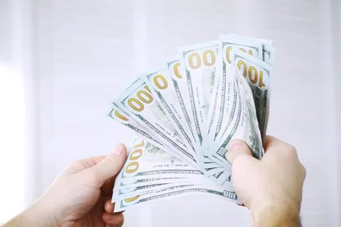 Group of money stack of 100 US dollars banknotes a lot of the background te.. 스톡 사진