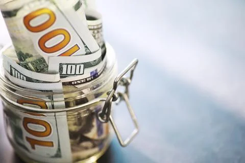 Group of money stack of 100 US dollars banknotes a lot of the background te.. Foto stock