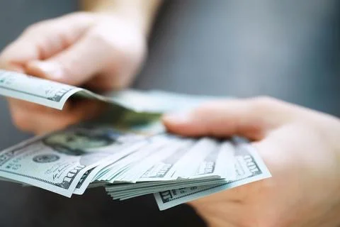 Group of money stack of 100 US dollars banknotes a lot of the background te.. Foto stock