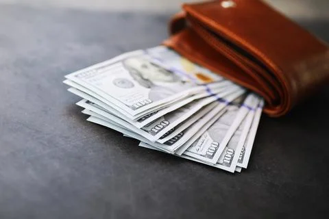 Group of money stack of 100 US dollars banknotes a lot of the background te.. Stock Photos