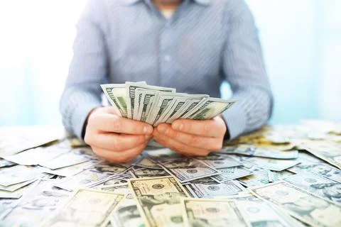 Group of money stack of 100 US dollars banknotes a lot of the background te.. Foto stock
