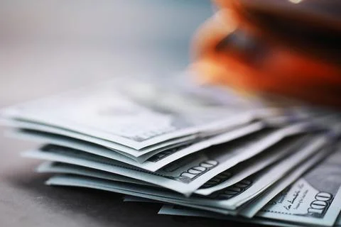 Group of money stack of 100 US dollars banknotes a lot of the background te.. 스톡 사진