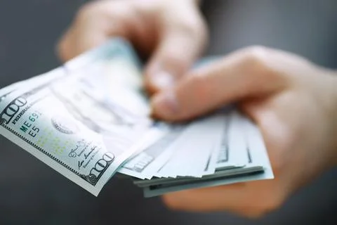 Group of money stack of 100 US dollars banknotes a lot of the background te.. Stock Photos