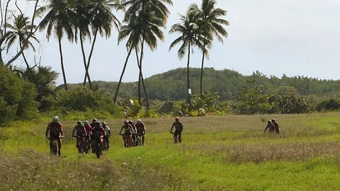 Group of Mountainbikers on a Trail Stock Footage 129632707
