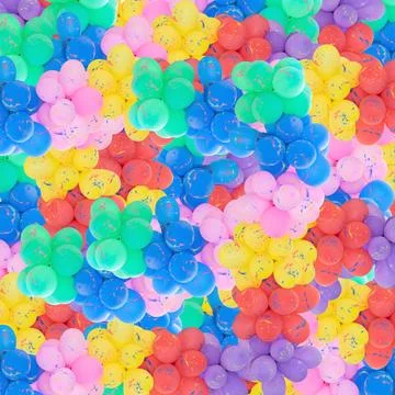 Group of multi colored balloons textured background. Stock Photos
