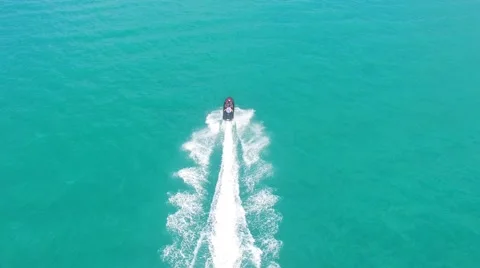 Group of multi ethnic friends sitting on a jet ski Video stock 61775577