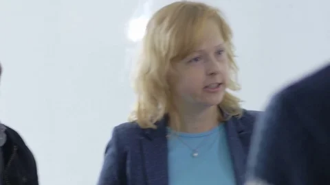 Group of multi-ethnic students discussing together with a lecturer Stock Footage 69933209