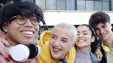 Group of multi-ethnic students having fun. POV Selfie Photo Stock Footage 221371367