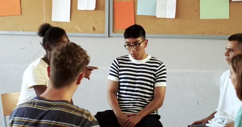 Group of multi-ethnic students talking about their emotions Stock Footage 227707387