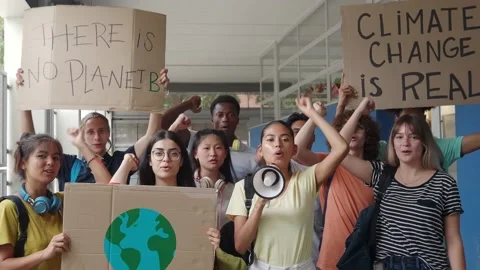 Group of multi-ethnic teenagers protesting against climate change. No planet b Stock Footage 162162764
