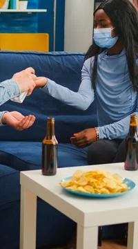 Group of multi ethnic using hand sanitizer gel to prevent covid19 spread Fotos Stock