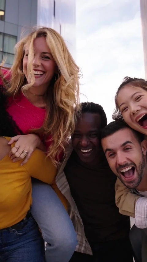 A group of multi-ethnic young friends are having fun in the city Stock Footage 270997257