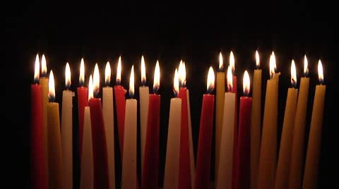 Group of Multicolored Candles on black background. Stock Footage 8963118