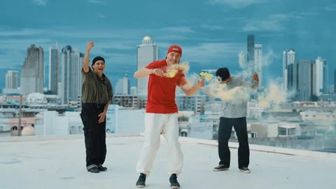 Group of multicultural hipster playing color flare at rooftop. hiphop. Stock Footage 261654756