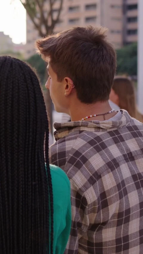 Group of multicultural students standing hugging together outside the university Stock Footage 273000711