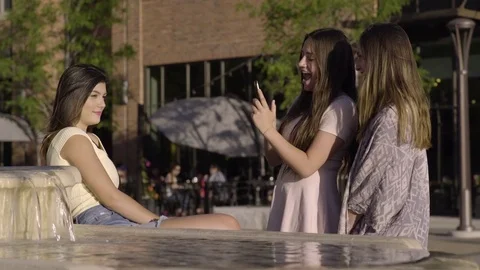 Group Of Multiethnic Friends Enjoy Sightseeing, Teen Takes Photo Of Her Friend Stock Footage 76855403