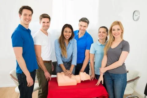 Group Of Multiethnic People Learning How To Perform Cpr Stockfoto's