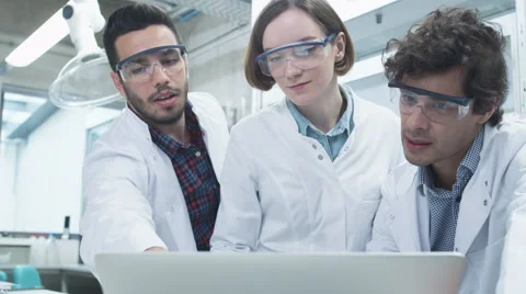 Group of Multiethnic Students using Laptop in Laboratory of Chemistry Classroom Stock Footage 62953405
