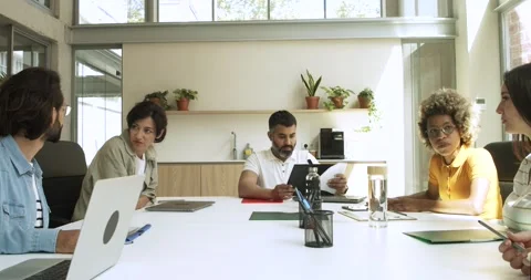 Group of multiethnic workers working in an office or coworking. Teamwork Stock Footage 171676706