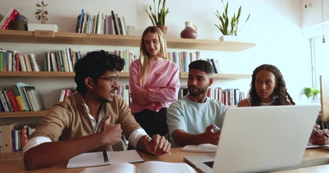 Group of multinational schoolmates working together on joint project Stock Footage 263554933