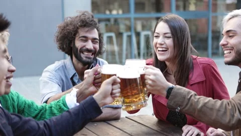 Group of multiracial friends drinking beer at brewery bar after work Stock Footage 161998702