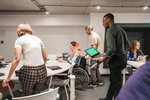 Group of multiracial, multicultural businesspeople preparing for work and modern Stock Photos