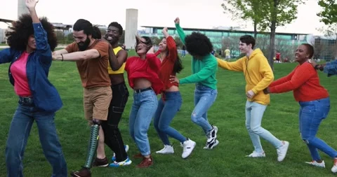 Group of multiracial people dancing together outdoor - Concept of diversity Stock Footage 192382325