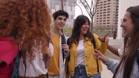 Group of multiracial young students having fun walking together on college Stock Footage 240948728